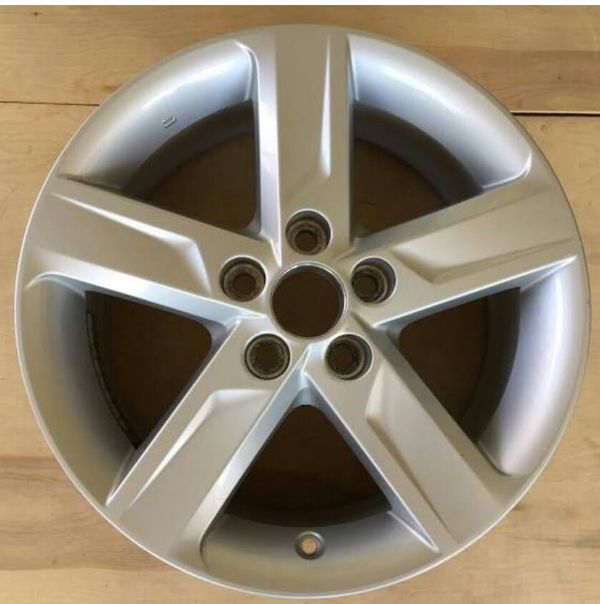 Stock wheels for a 2014 Toyota Camry. Set of 4, two of them new and the
