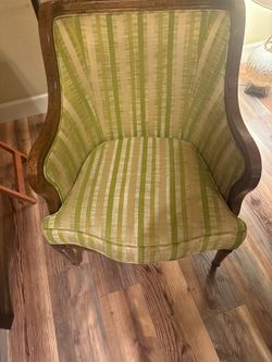Two beautiful wooden chairs that are very comfortable