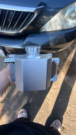 Universal oil catch can