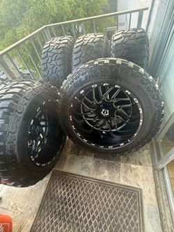 (5)  22 inch rims and off-road tires new
