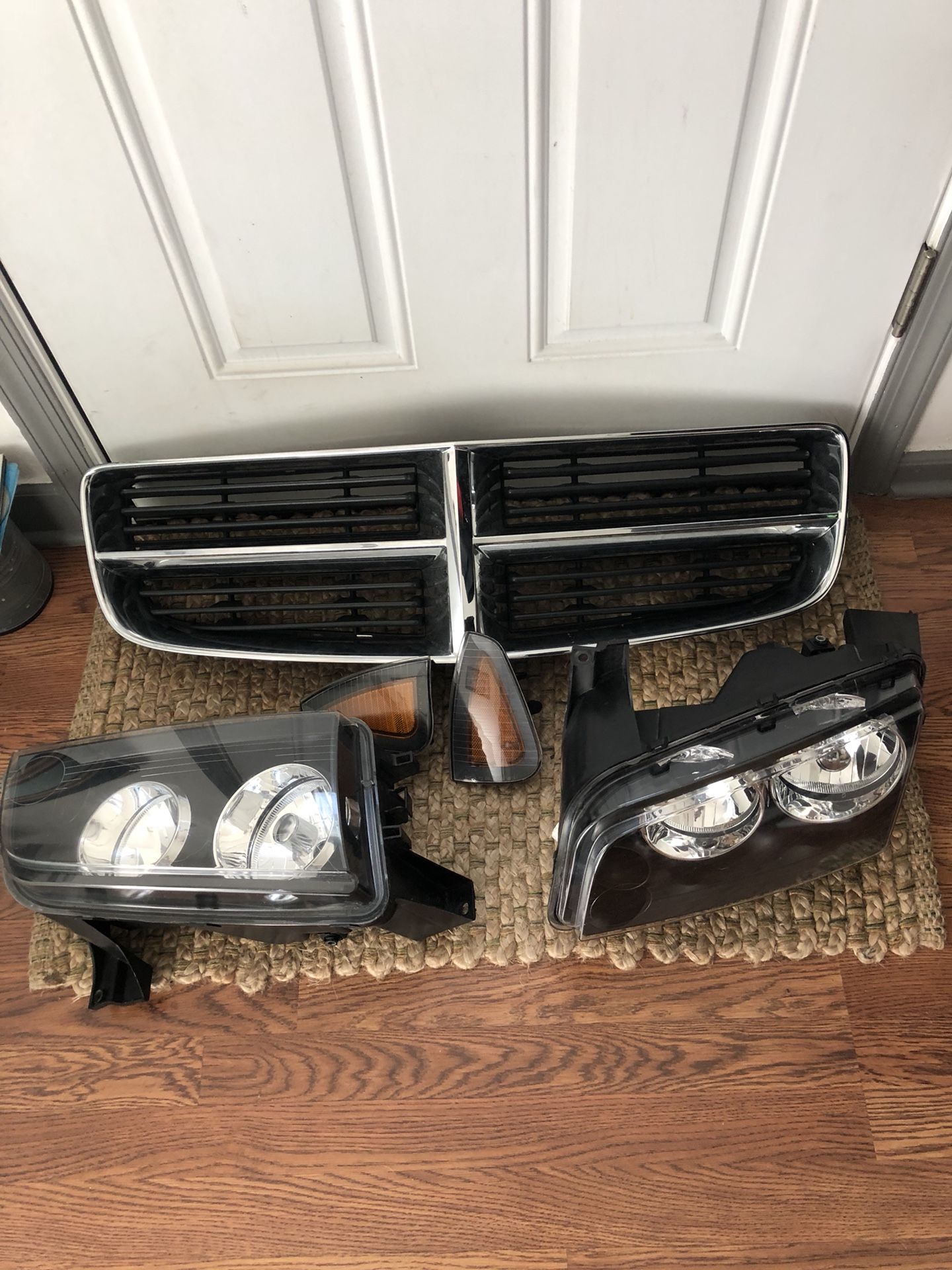 2008-2010 Dodge Charger factory head lights with corner/signal plates(1 set), and factory grill...