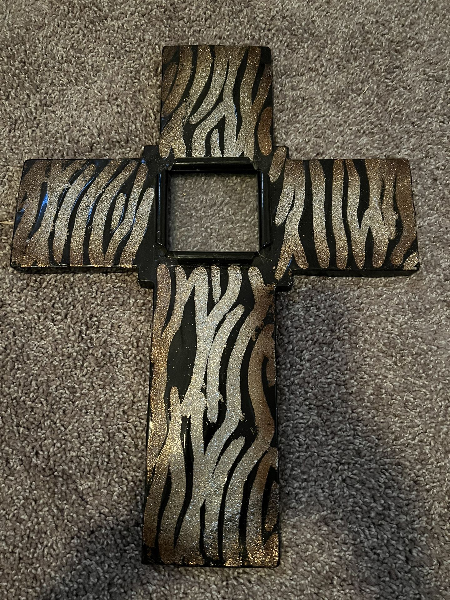Cross - glitter pattern, metal with glass center.