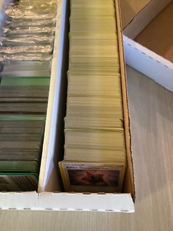 Pack Fresh 5000 Pokémon non Holo Cards including a row and a half of YELLOW BORDER Era along with a few ETB Boxes of energy cards sealed and VINTAGE