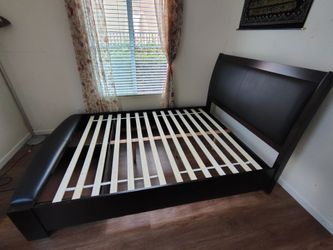 Wooden queen sized bed frame