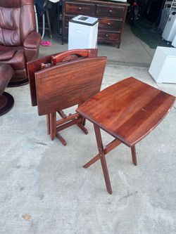 3 foldable tables and holder