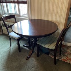 Café table and two chairs