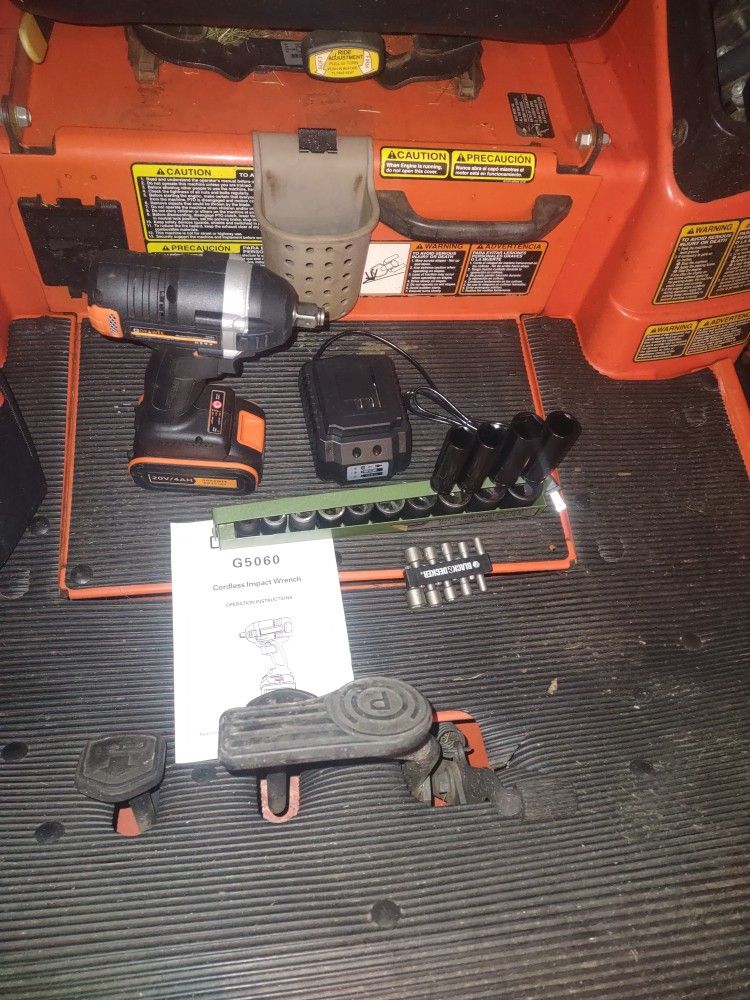 20 Volt Cordless Half Inch Impact Gun And Sockets