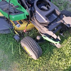 John Deere  x300 riding mower parts