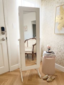 Beautiful standing mirror jewelry cabinet with white frame and base