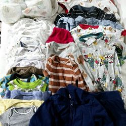 Newborn baby clothes and diapers