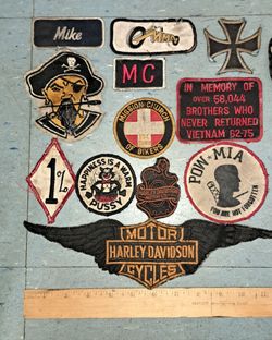 16 Assorted Embroidered jacket patches. Sew on only