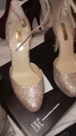 23 PAIRS OF WOMEN’S HIGH HEELS — $325 FOR THE ENTIRE LOT!**