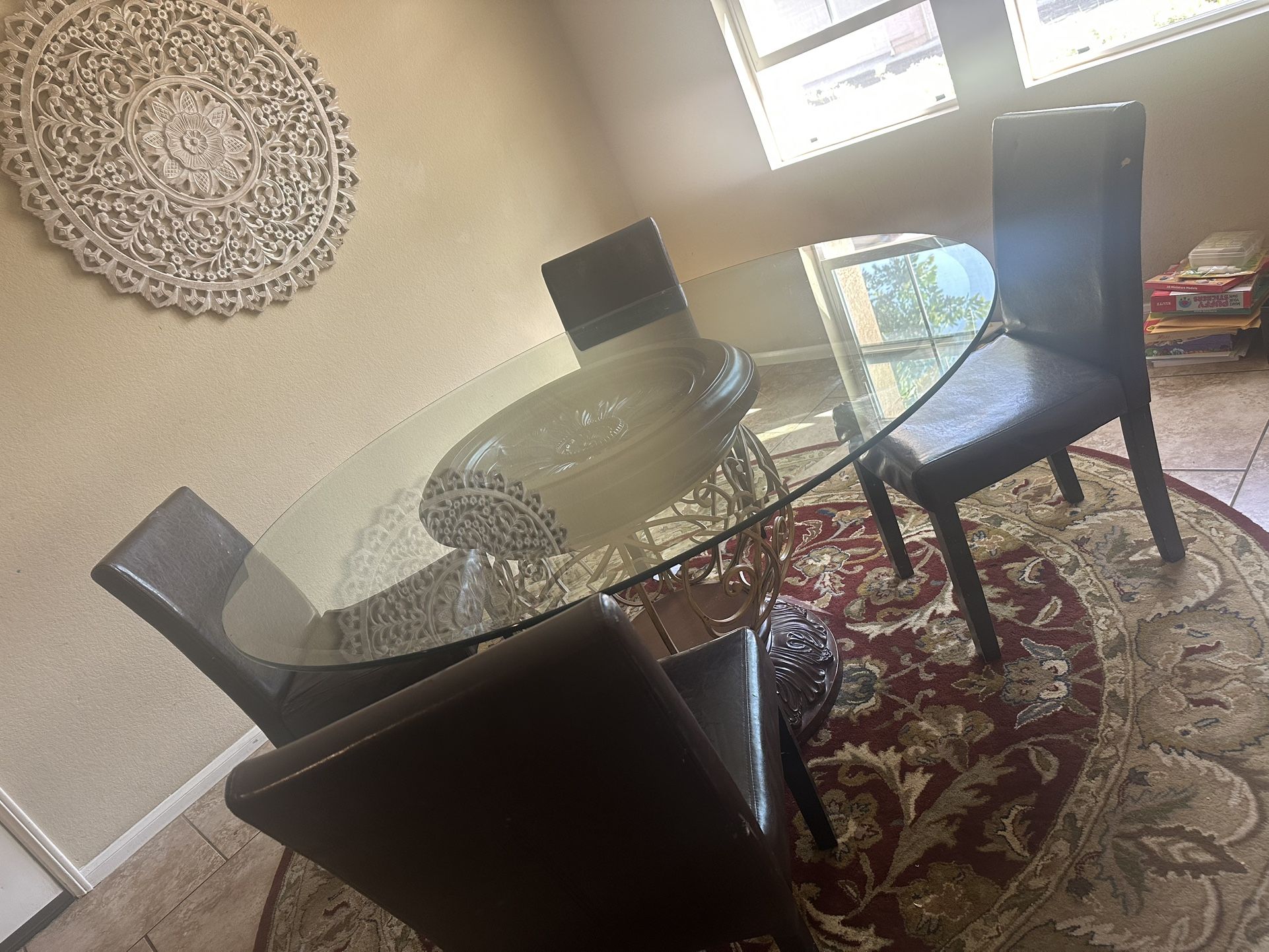 60” Glass Table And Rug With Chairs