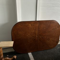 solid wood dining table with  2 leaves