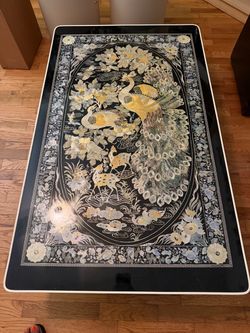 Lady of pearl table