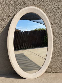 Large oval wall mirror