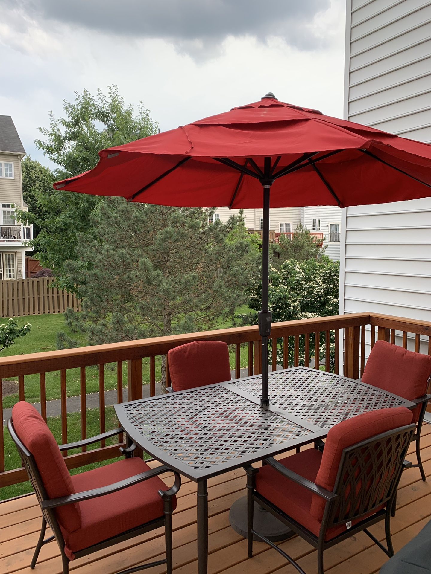 Patio furniture with 6 chairs and umbrella