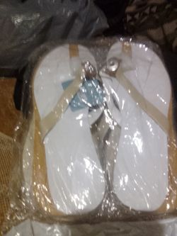 Two pair of goodbead brand flip flop