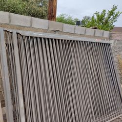 Gray metal fence  .I have 10 panels  size .each panel.  8'feet wide X 6' feet tall. ..around 80'feet long   all.    $. 550.