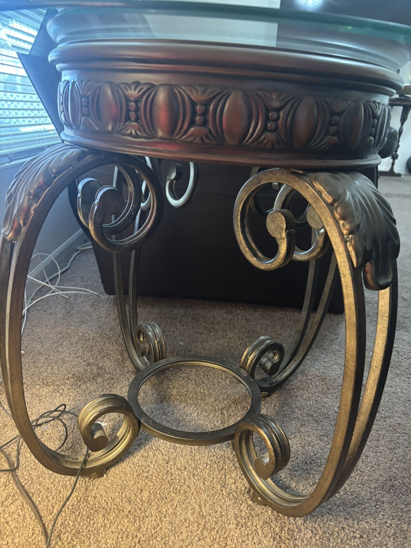 Wrought iron and glass end table-25 inch tall/26 inch across