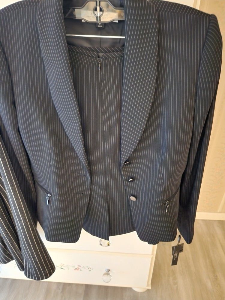 Pinstripe 2 piece suit size, 8 price tag, $280.
Will sell for30.