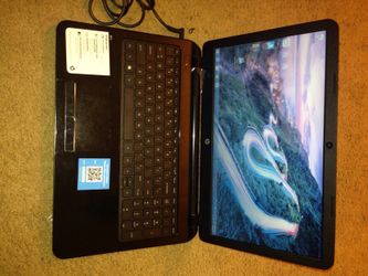 Almost new black hp laptop with case