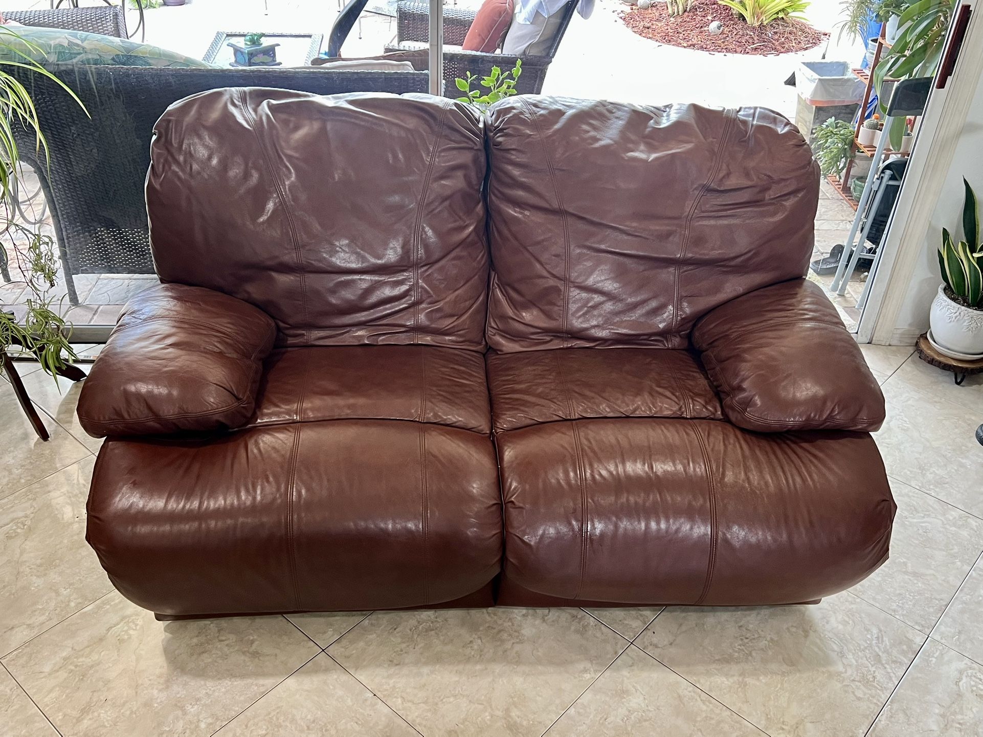 Leather reclining couch, excellent condition