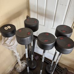Commercial straight bars 75-100lbs weights 525lbs total
