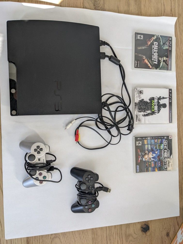 PlayStation 3 With 2 Controllers and Call Of Duty