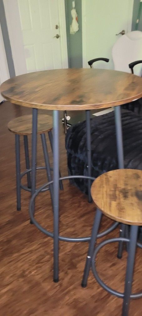 Bar Table and 2 stools.