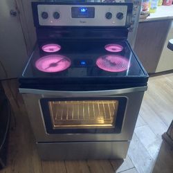 Black And Stainless Whirlpool Glass Top Stove With Dual Function Self Cleaning Oven Works Excellent 