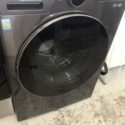 NEW WASHER AND DRYER 2 IN 1