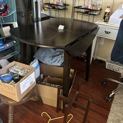 Round table with fold down sides