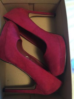 Red suede pumps