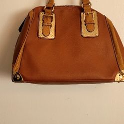 BEAUTIFUL LEATHER BAG  ALDO WITH METAL GOLDEN PLAQUES DETAILS.
