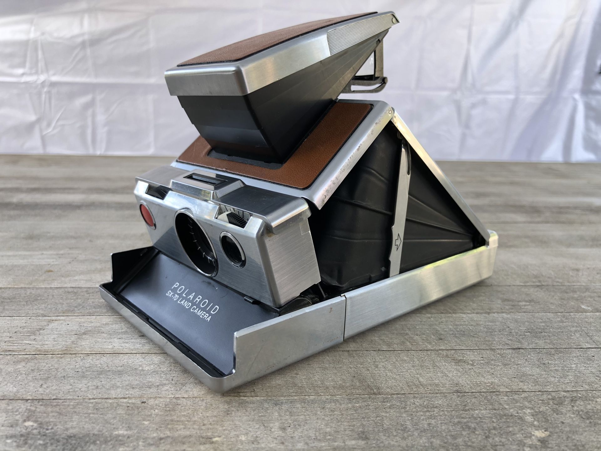 Polaroid SX-70 instant camera with leather case