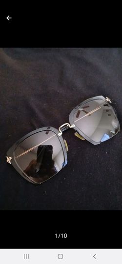 Miu Miu sun glasses