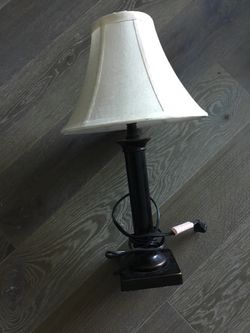 Black metal lamp with off white shade