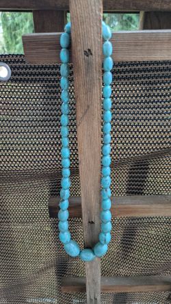 Turquoise colored beaded necklace