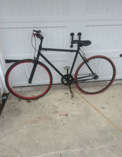 Fixie With Red Rims And Tires. 