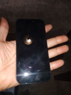 Black Smartphone with Gold Button