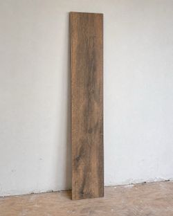 $0.75/sqft - Mud Oak Laminate Flooring