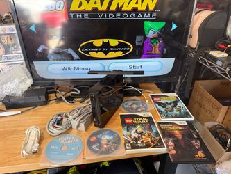 Black Nintendo Wii Console W/ 6 Games Wires Controllers Lego Star Wars Batman   The product is a Nintendo Wii home console in black color, model Wii (