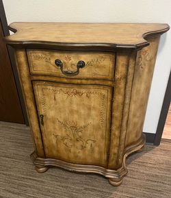 Curved French Country cabinet