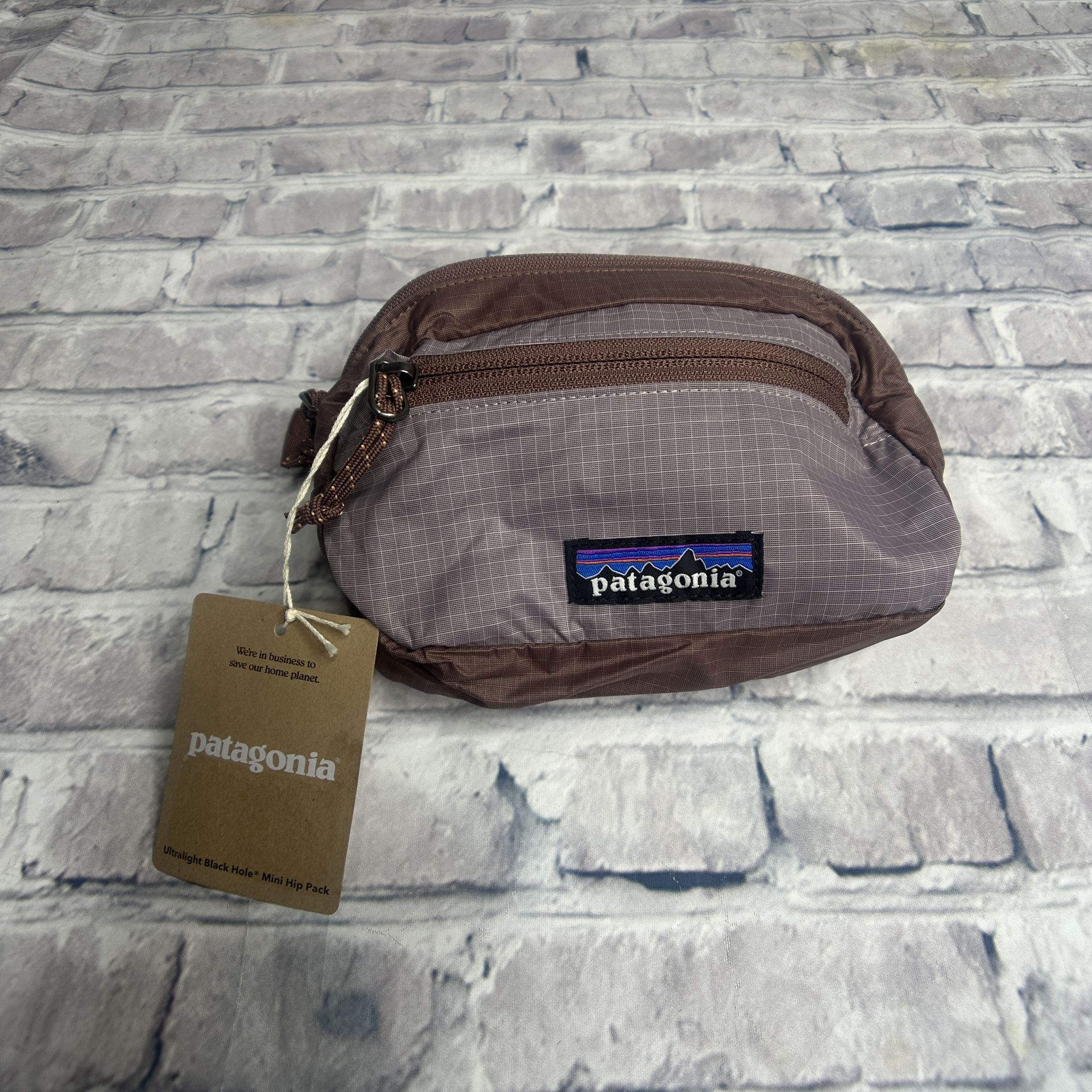 NWT Patagonia Ultralight Black Hole Mini Hip Pack ONE SIZE (Mauve)