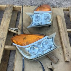 Rendezvous Headlights Pair