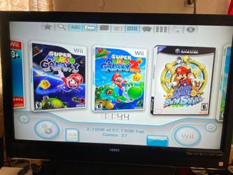NINTENDO WII + 2500 GAMES INSTALLED