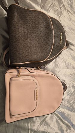 2 Michael Kors backpacks