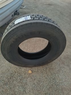 295/75R22.5heavy-duty commercial truck tire for a semi.
