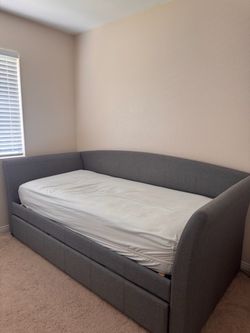 Gray daybed with pullout twin
